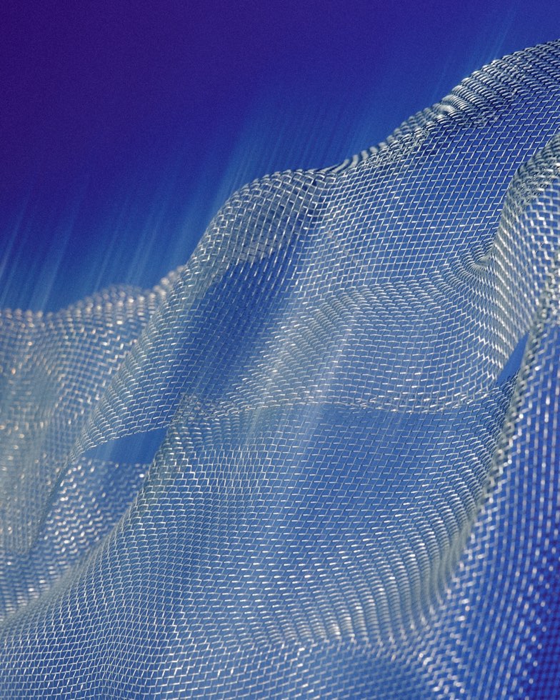 green beads clustered on metallic liquid surface